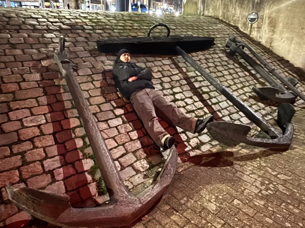 representation of Movement Foundations where the founder of asquaredrills is posing his two legs in old boat anchor which means a balanced mind and body while anchoring your emotions which reflects the movement